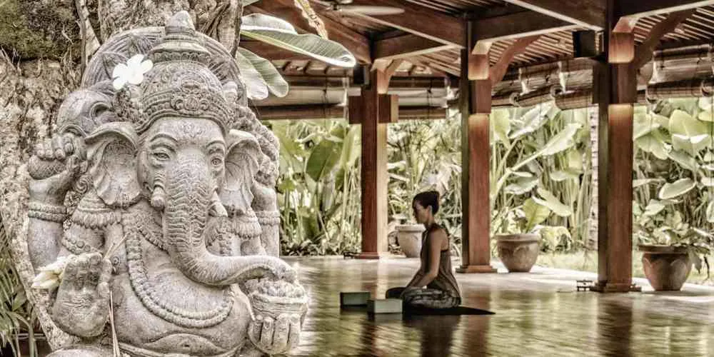 Meditation in sacred pavilion at Komune Bali